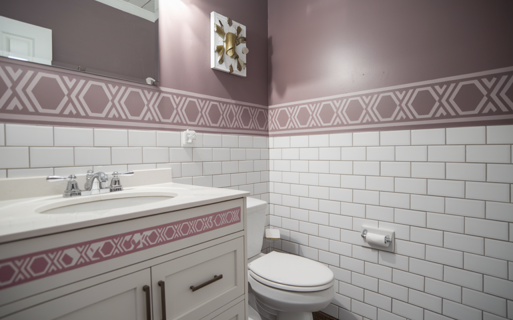 Walls of Style NY bathroom transformation, tailored to the client's wish to modernize their mauve palette with the look of timeless subway tiles and a sleek updated vanity in Brooklyn, NY.