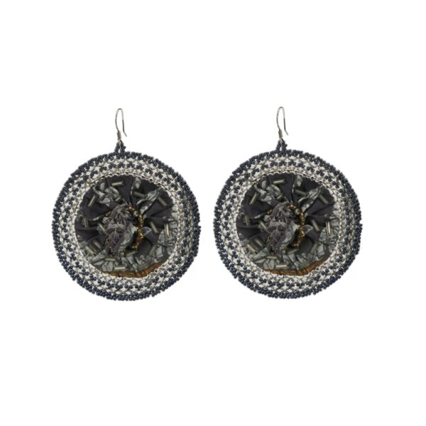 Ankara fabric round-shaped earrings in classic black and white, adorned with matching seed beads. Handcrafted with precision and passion. These earrings seamlessly blend cultural charm with contemporary flair.