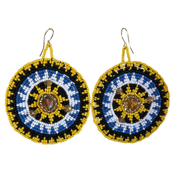 Handmade circular beaded earrings in bold yellow, blue, black, and white with a sunburst Maya-inspired design