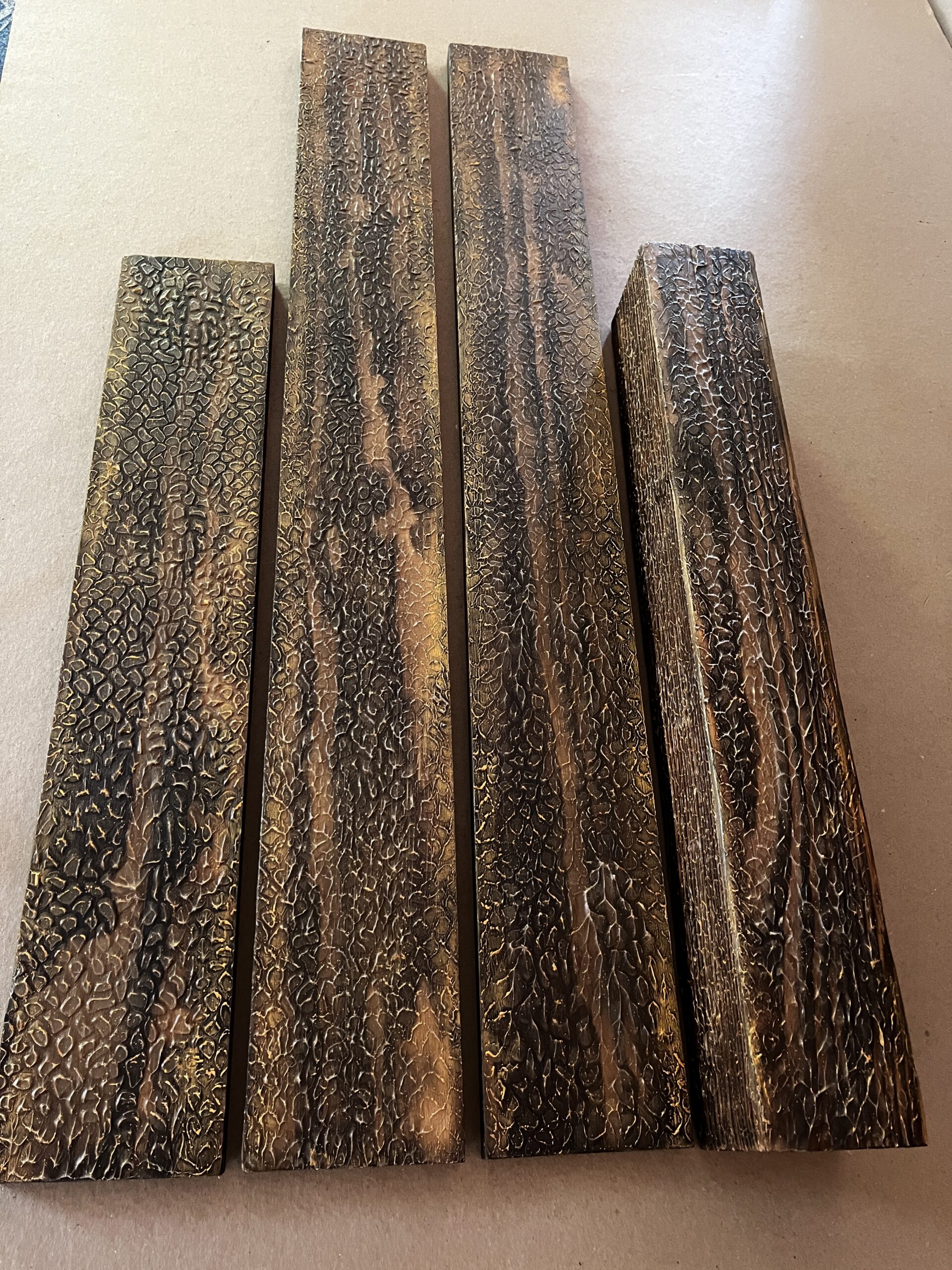 Python textured wood wall panels with hand-finished python-inspired surface