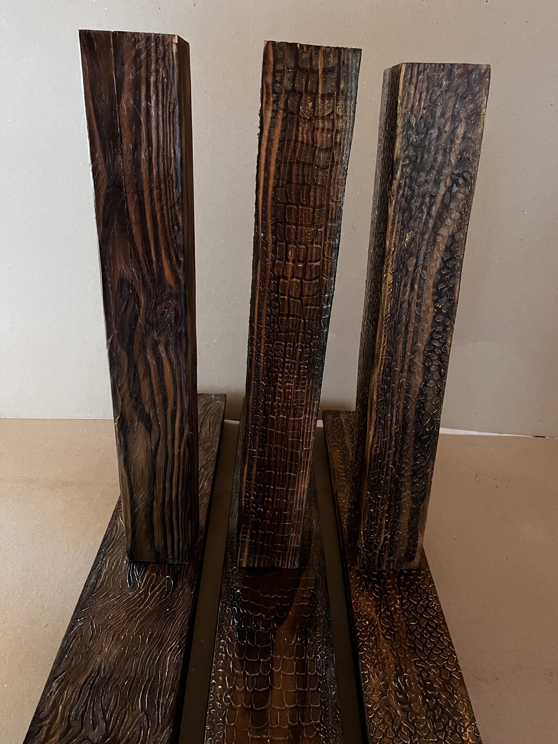 Python textured wood wall panels with hand-finished python-inspired surface